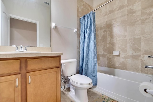 full bathroom with vanity, shower / tub combo, toilet, and tile patterned flooring