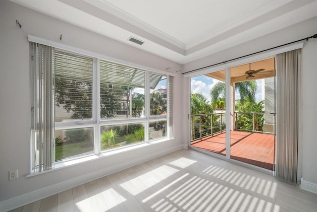 1030 Bellasol Way Unit 201, Apollo Beach, FL 33572 - unfurnished sunroom with crown molding and baseboards