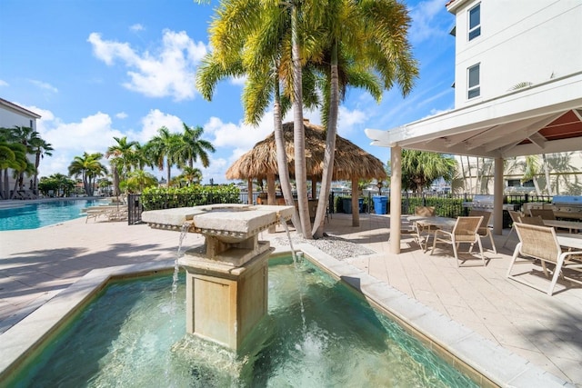 1030 Bellasol Way Unit 201, Apollo Beach, FL 33572 - swimming pool featuring a gazebo, a patio, and fence