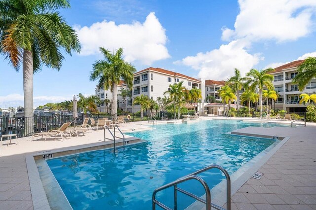 1030 Bellasol Way Unit 201, Apollo Beach, FL 33572 - community pool featuring fence and a patio