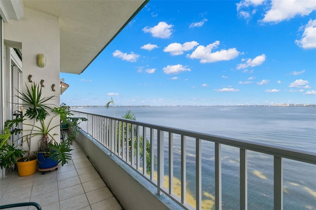 balcony featuring a water view