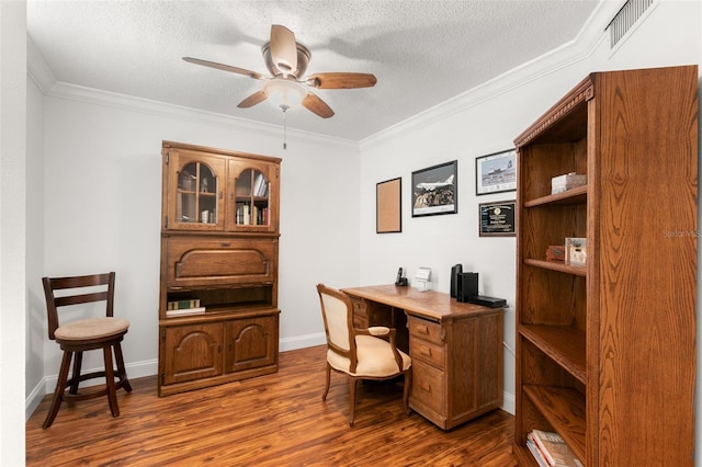 office featuring ceiling fan, a textured ceiling, crown molding, and dark wood-type flooring