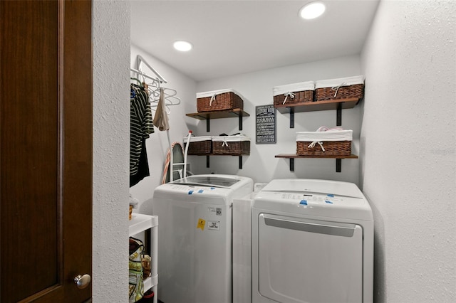 5153 Isla Key Blvd S Unit 412, Saint Petersburg, FL 33715 - laundry room with washer and dryer, recessed lighting, and laundry area