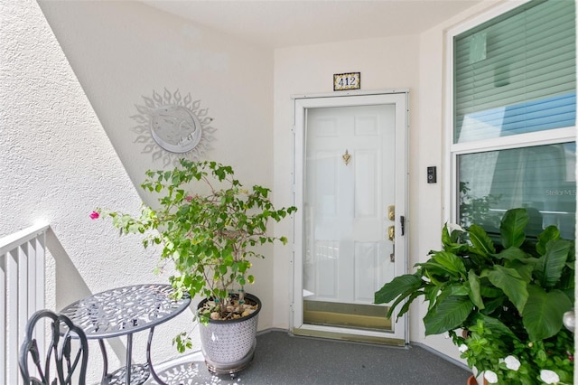 5153 Isla Key Blvd S Unit 412, Saint Petersburg, FL 33715 - view of exterior entry featuring stucco siding