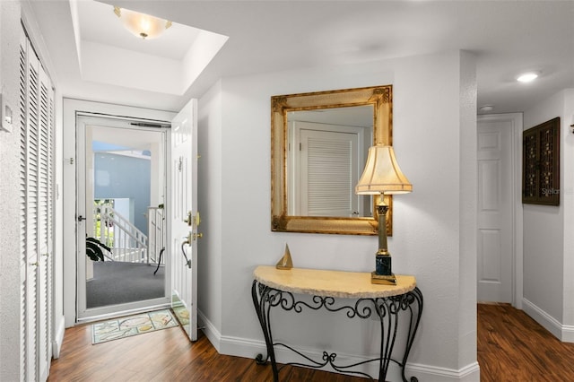 5153 Isla Key Blvd S Unit 412, Saint Petersburg, FL 33715 - hallway featuring baseboards and wood finished floors