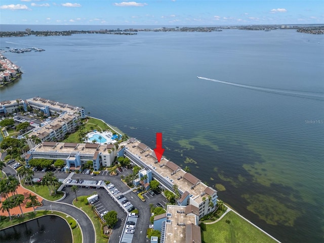 birds eye view of property featuring a water view