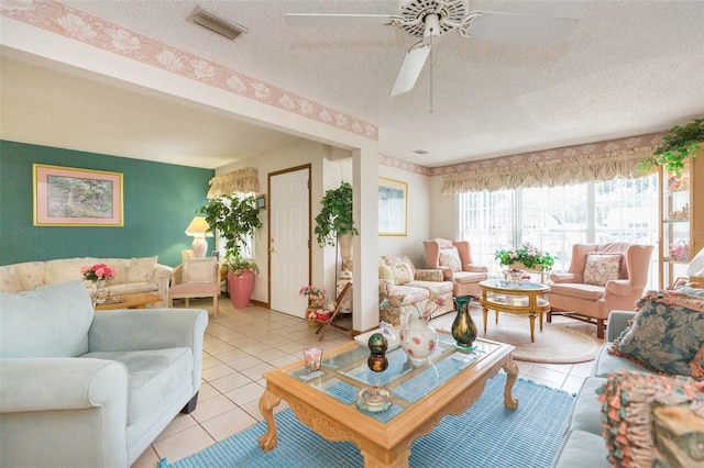 interior space with ceiling fan