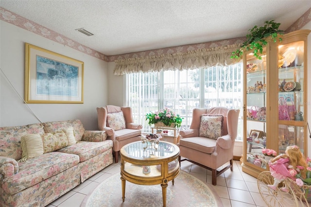 tiled living room with a textured ceiling