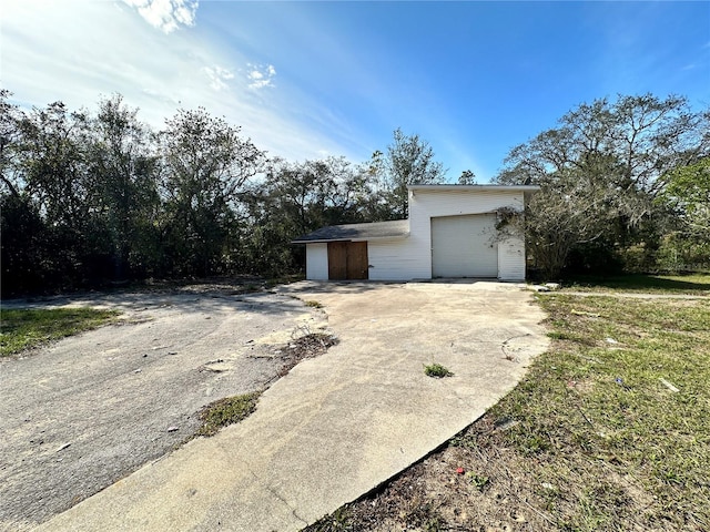 exterior space with a garage