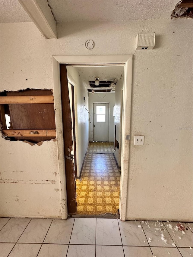 17025 Dalberg Dr, Spring Hill, FL 34610 - corridor featuring light floors