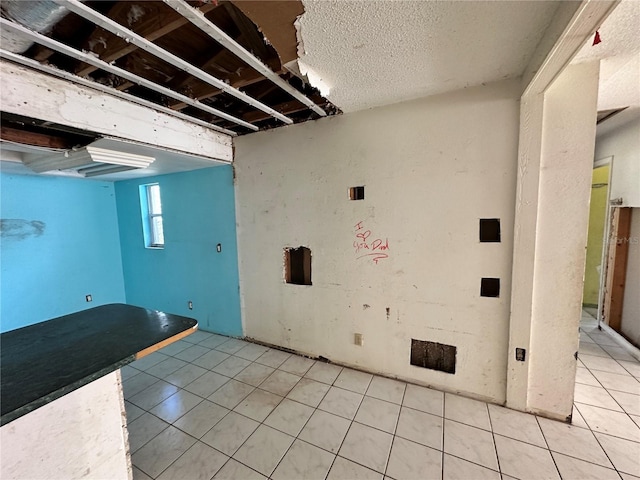 17025 Dalberg Dr, Spring Hill, FL 34610 - spare room featuring light tile patterned floors