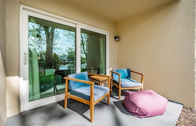 1450 Heather Ridge Blvd Unit 107, Dunedin, FL 34698 - view of patio / terrace