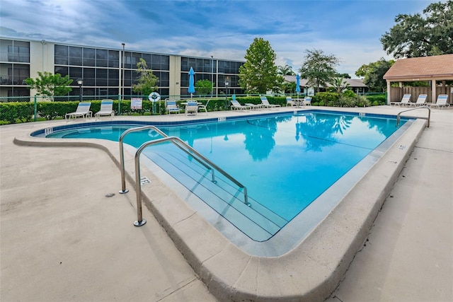 view of pool with a patio