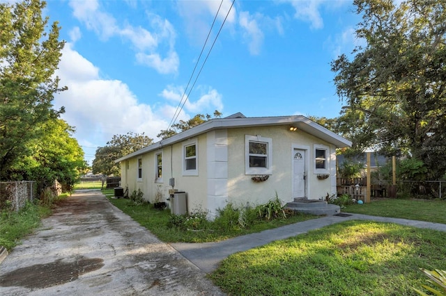 bungalow with a front lawn