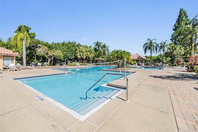 view of pool featuring a patio area