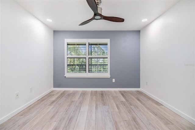 unfurnished room featuring light hardwood / wood-style flooring and ceiling fan