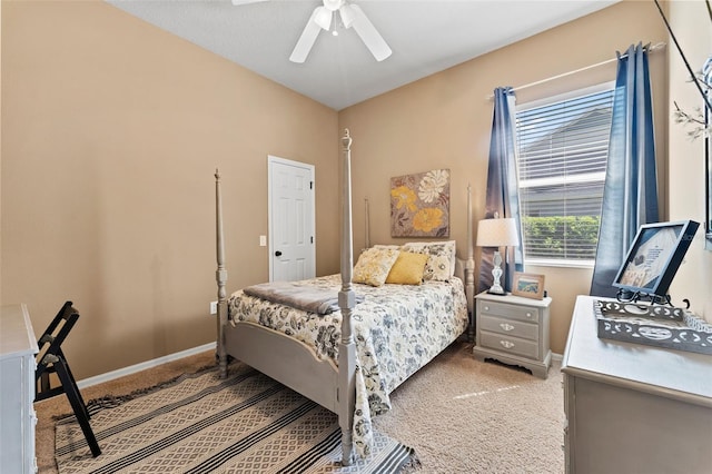 bedroom featuring light carpet and ceiling fan