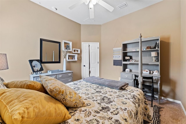 bedroom featuring ceiling fan and carpet