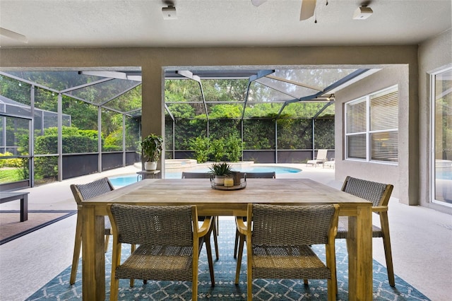 sunroom / solarium with ceiling fan