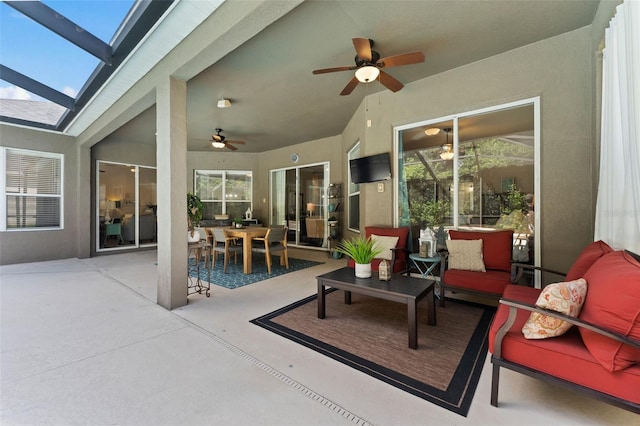 view of patio with ceiling fan and an outdoor hangout area