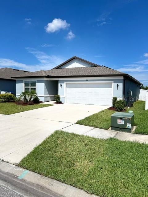 ranch-style house featuring a garage, driveway, a front yard, stucco siding, and roof with shingles
