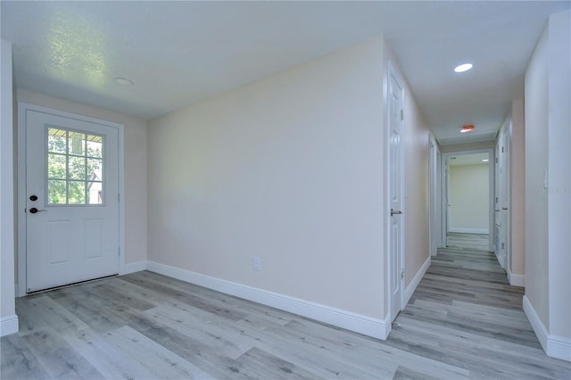 foyer with light wood-type flooring