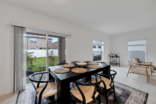 dining area with light tile patterned floors