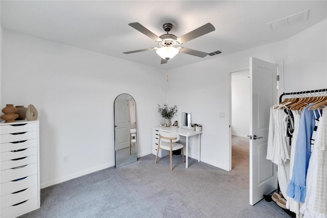 bedroom featuring ceiling fan and light carpet