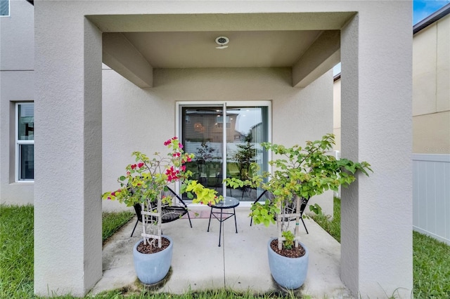 property entrance with a patio