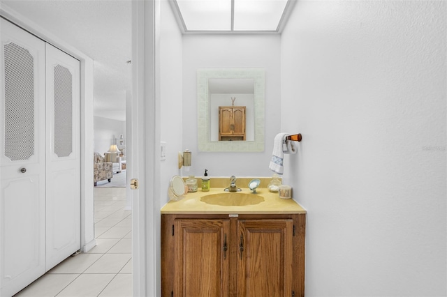 bathroom featuring vanity and tile patterned flooring