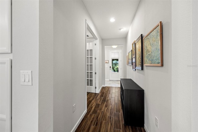 hall featuring dark wood-type flooring