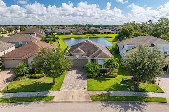 bird's eye view with a water view