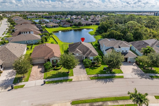 drone / aerial view featuring a water view