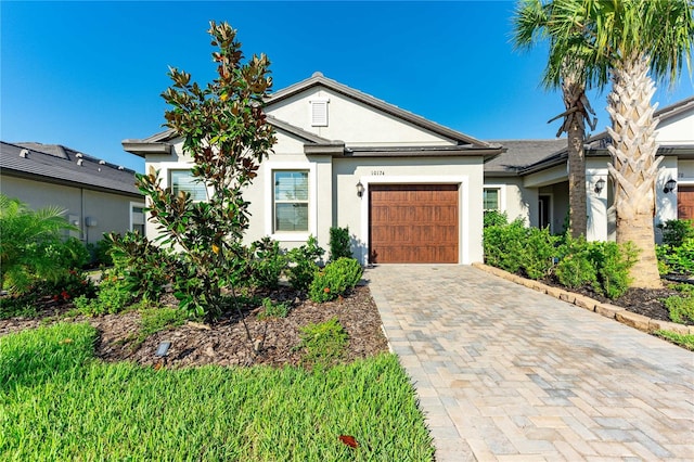 single story home featuring a garage