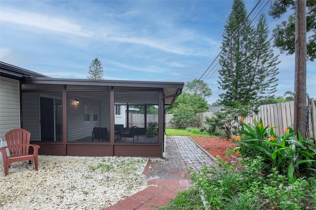 exterior space with a sunroom