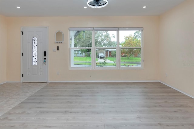 foyer entrance featuring light hardwood / wood-style flooring