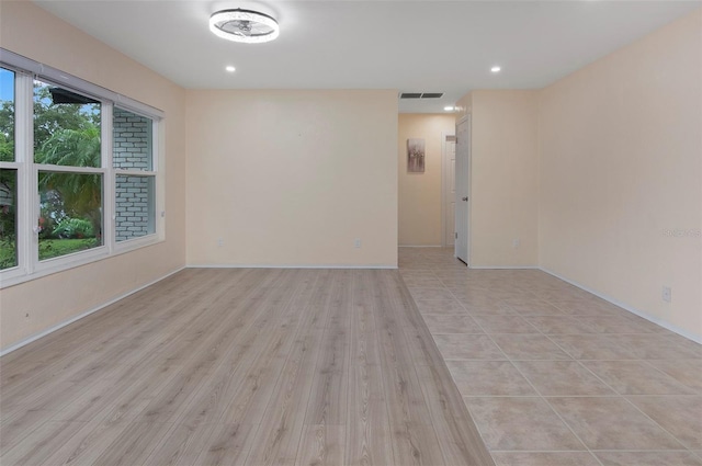 empty room with light wood-type flooring