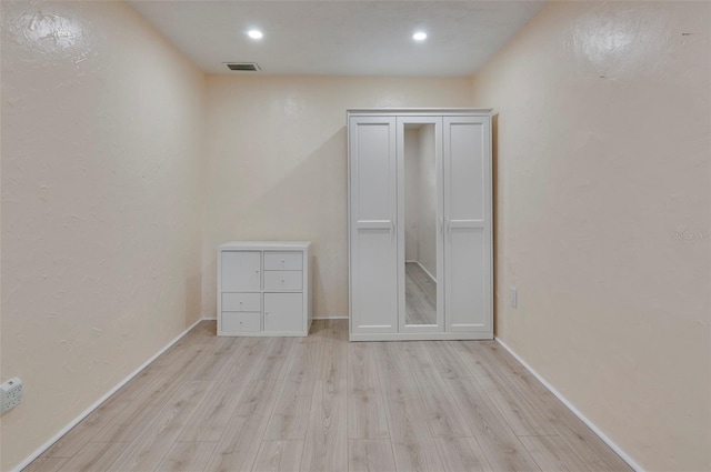 unfurnished bedroom featuring light hardwood / wood-style floors