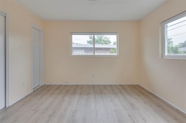 unfurnished bedroom featuring light hardwood / wood-style floors