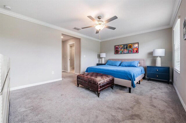 carpeted bedroom featuring ceiling fan and crown molding