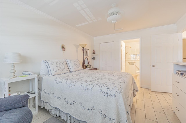 bedroom featuring ceiling fan, ornamental molding, light hardwood / wood-style flooring, a closet, and ensuite bath