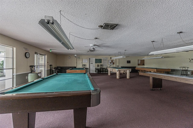 rec room featuring pool table, a textured ceiling, carpet floors, and ceiling fan