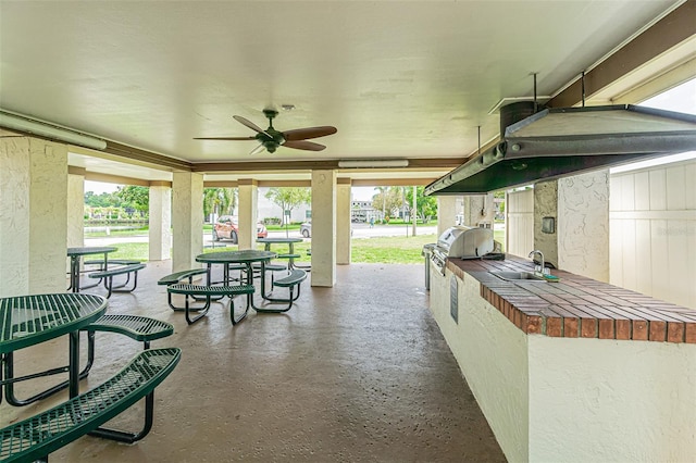 view of patio featuring sink and ceiling fan