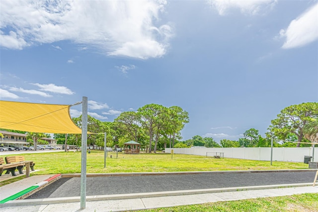 exterior space featuring a gazebo and a yard