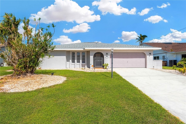 ranch-style home with a front yard and a garage