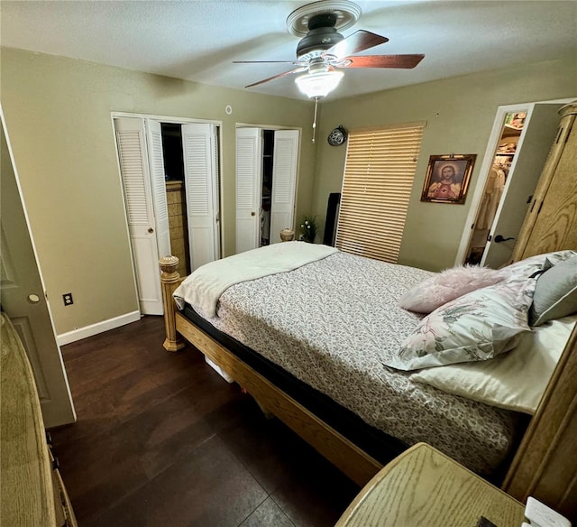 bedroom with ceiling fan and dark hardwood / wood-style flooring