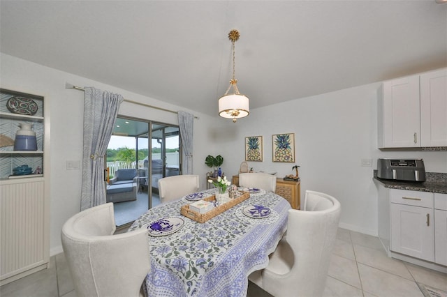 dining space with light tile patterned floors