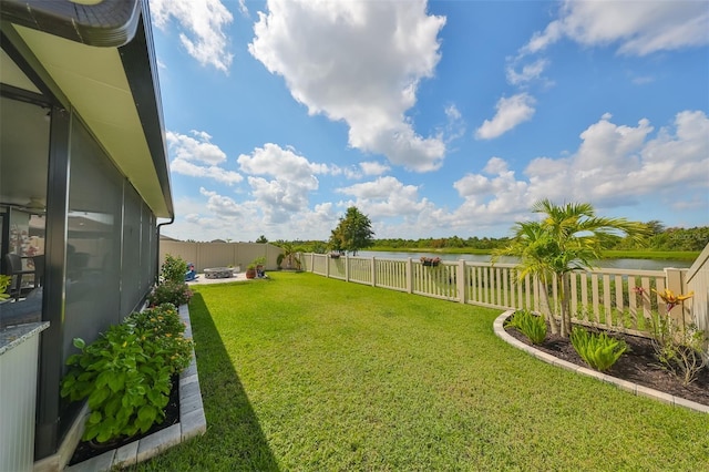 view of yard with a water view