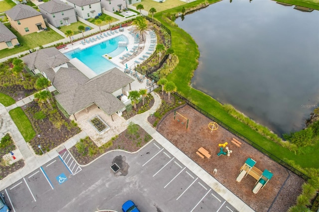 drone / aerial view with a water view