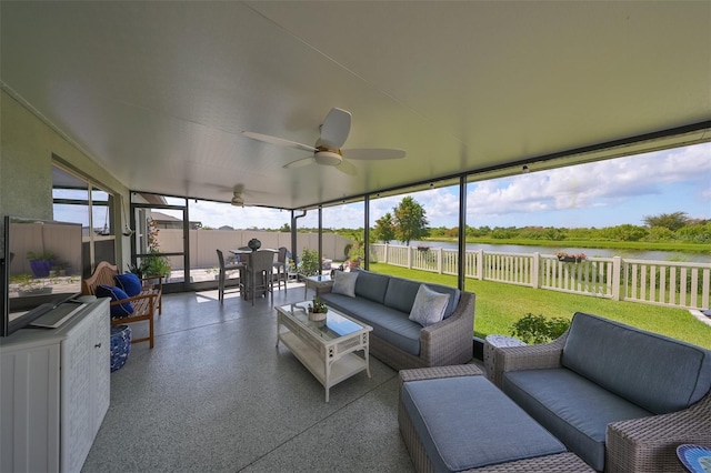 sunroom / solarium with ceiling fan